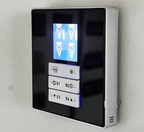 Insignia Series AC4B panel — black glass LCD with rocker buttons
